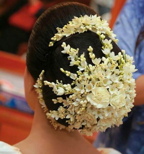 Indian bridal hairstyles inspiration | Fresh flower hairstyles | Indian  brides | Side buns adorned wi… | Indian hairstyles, Indian wedding  hairstyles, Bridal hairdo