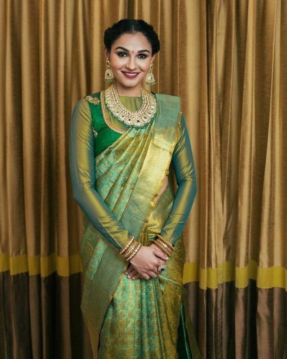 Actress andrea green silk saree