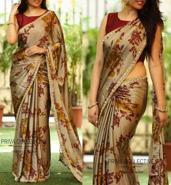 actress in Sleeveless blouse with Beautiful Floral print saree