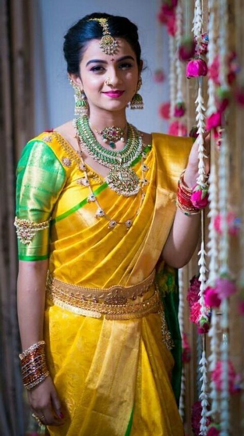 yellow Kanchipuram silk saree green blouse